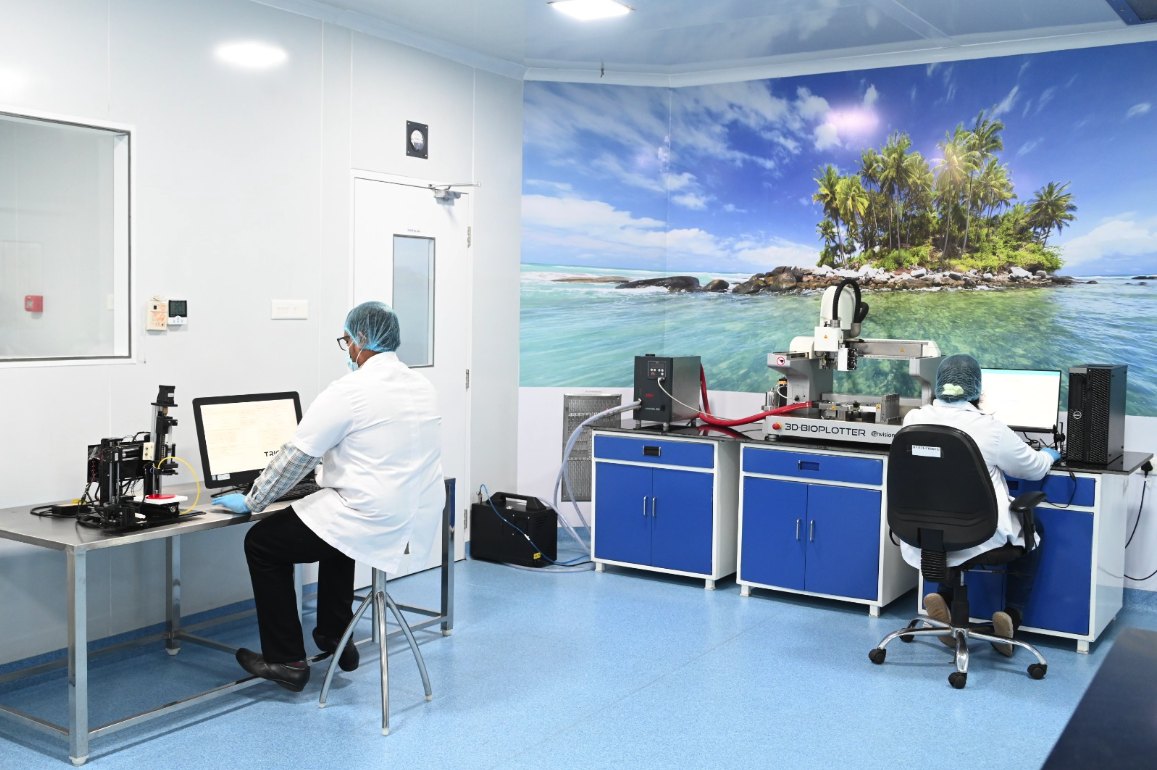 Researchers at the 3D-Bioplotter and TRICEP printer in the ORGEN lab